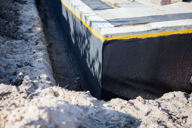 Professional Waterproofing technician working in Clinton, MI